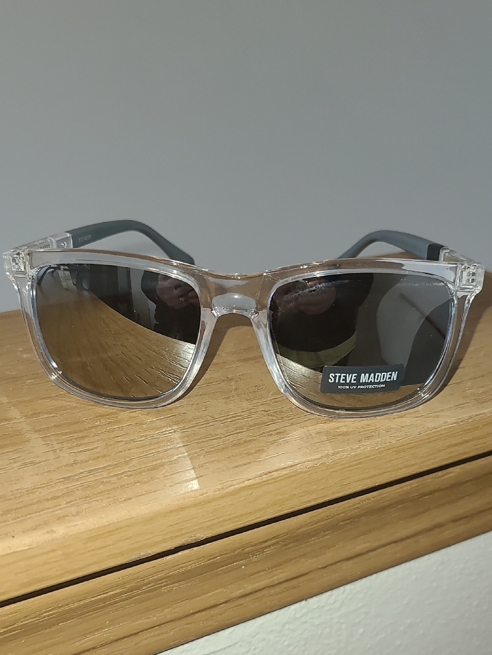 Steve Madden Clear Frame Sunglasses with Reflective Lenses
